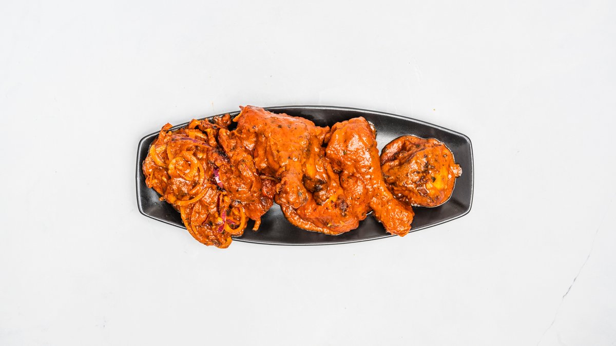 Tandoori chicken – 200g, bone-in chicken thighs marinated in a mixture of yogur...