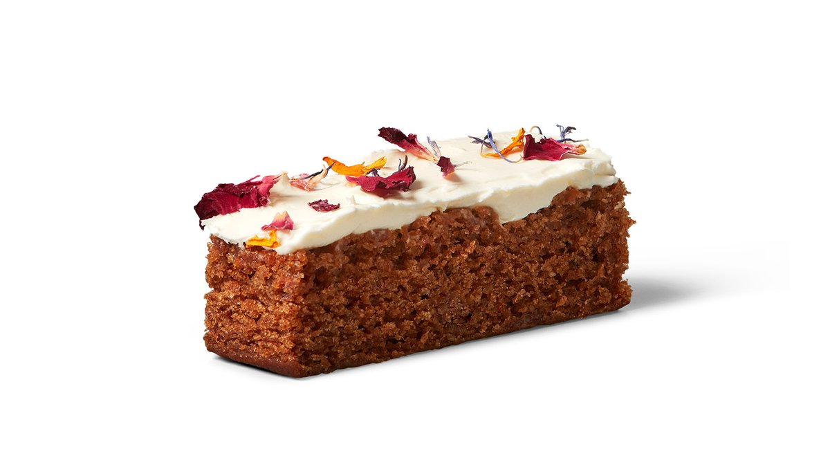 Carrot cake glutenfree – En glutenfri saftig morotskaka med färskostglasyr. Toppad me...