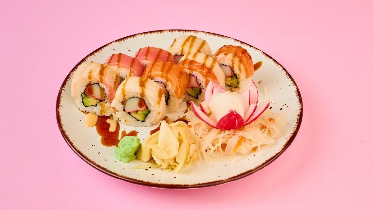 Rainbow Roll – with imitation crab meat, avocado, cream cheese, salmon, tun...