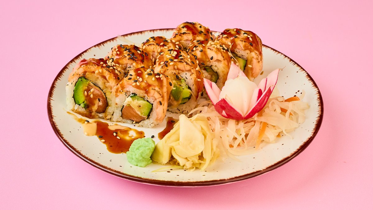King Roll – with baked salmon and cream cheese in a flambéed salmon coat...